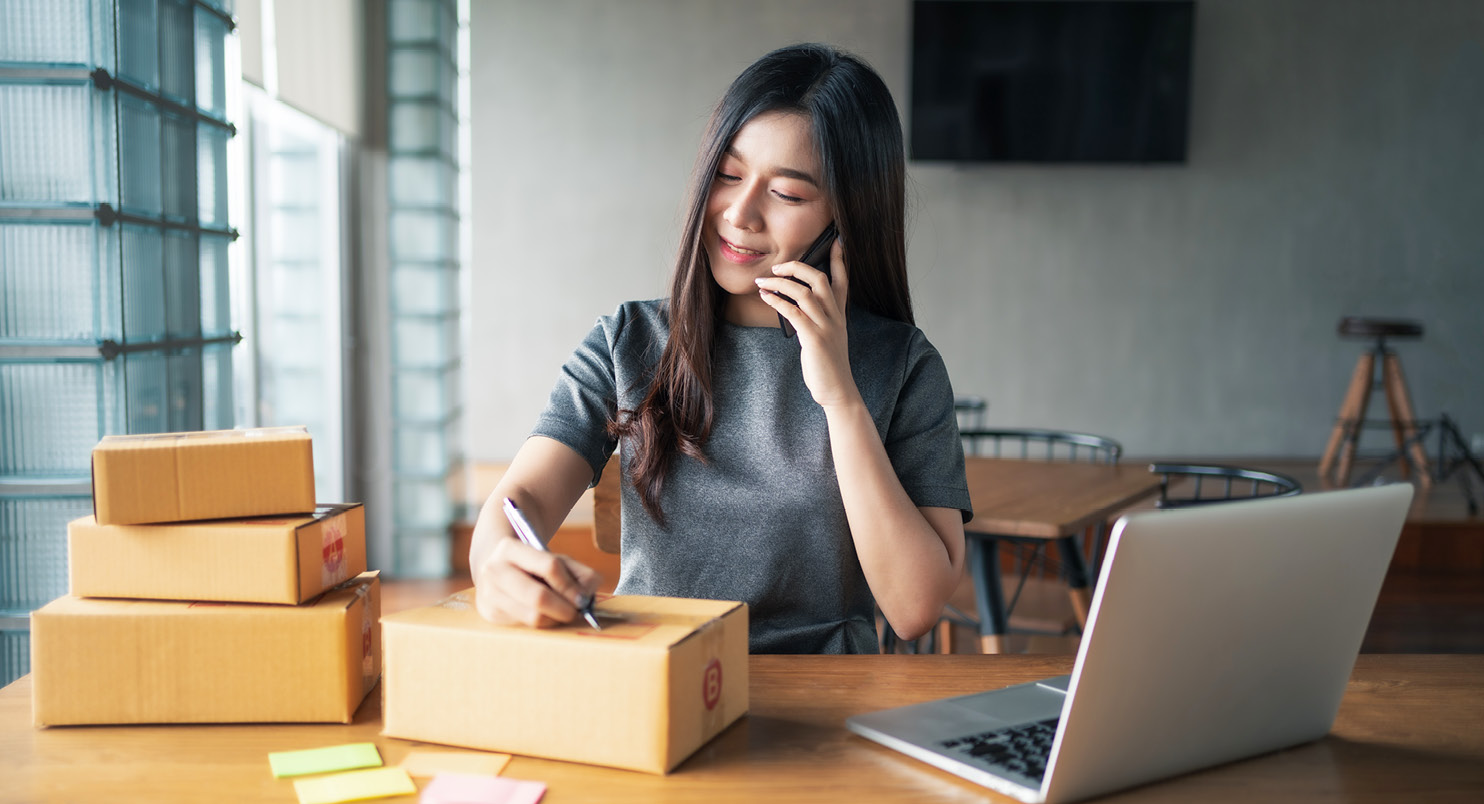 Business woman working at laptop