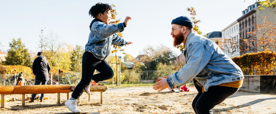 Dad and son playing