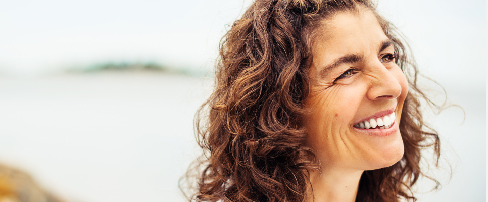 Woman smiling outdoors